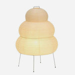 Nerine Tiered Washi Paper Table Lamp | Washi Paper and Metal | Front full view on a pure white background, illuminated | Severn Lighting