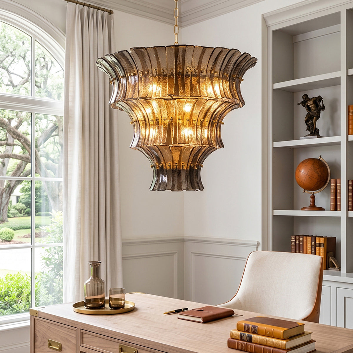 Octavia Sculptural Smoked Glass Chandelier | Textured Smoked Glass | Suspended above a classic wooden desk with an elegant white leather chair in a bright room | Severn Lighting
