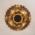 Octavia Sculptural Smoked Glass Chandelier | Textured Smoked Glass | Directly underneath view showcasing the concentric geometric pattern of the glowing glass layers | Severn Lighting