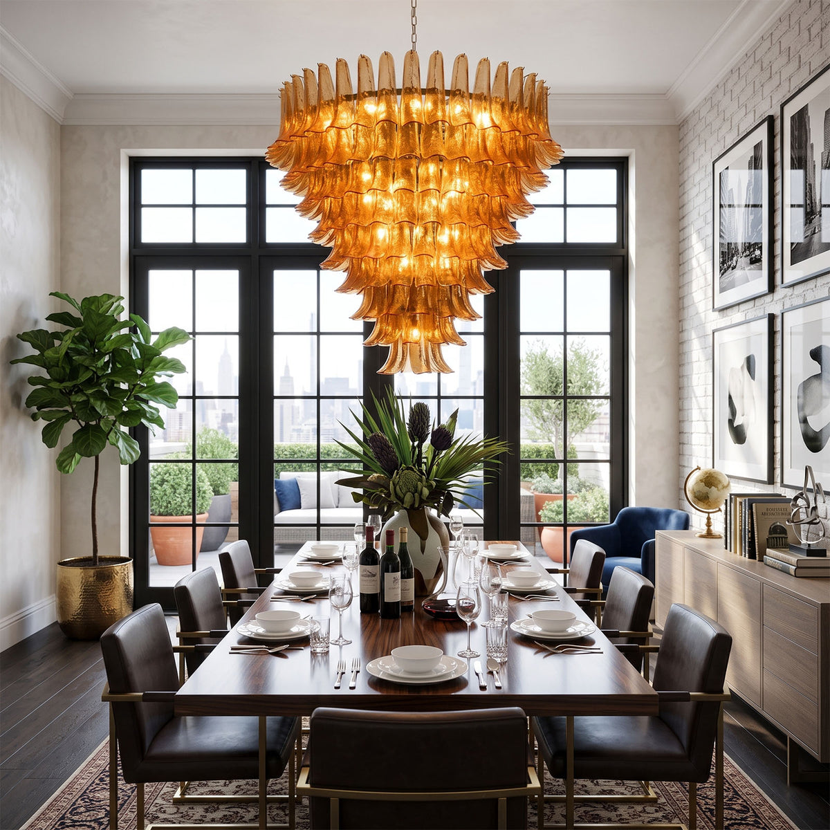 Odile Amber Petal Tier Chandelier | Amber Glass and Metal | Illuminating a long formal dining table with dark chairs and black doors | Severn Lighting