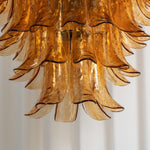 Odile Amber Petal Tier Chandelier | Amber Glass and Metal | Close-up view of the cascading amber glass petal tiers | Severn Lighting