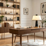Orsino Alabaster Trapezoid Table Lamp | Natural Alabaster, Black Metal and Brass | Displayed on a wooden desk in a home office study with tall bookshelves | Severn Lighting