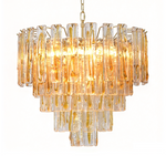 Orvelane Amber Swirl Glass Tiered Chandelier | Amber Swirl Glass and Brass | Front full view on a pure white background, illuminated | Severn Lighting