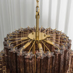 Ottoline Tiered Glass Chandelier | Textured Glass and Brass | Top perspective showing the brass central structure and support arms | Severn Lighting