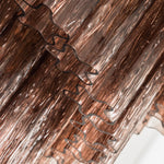 Ottoline Tiered Glass Chandelier | Textured Glass and Brass | Detail shot focusing on the textured surface of the glass rods | Severn Lighting