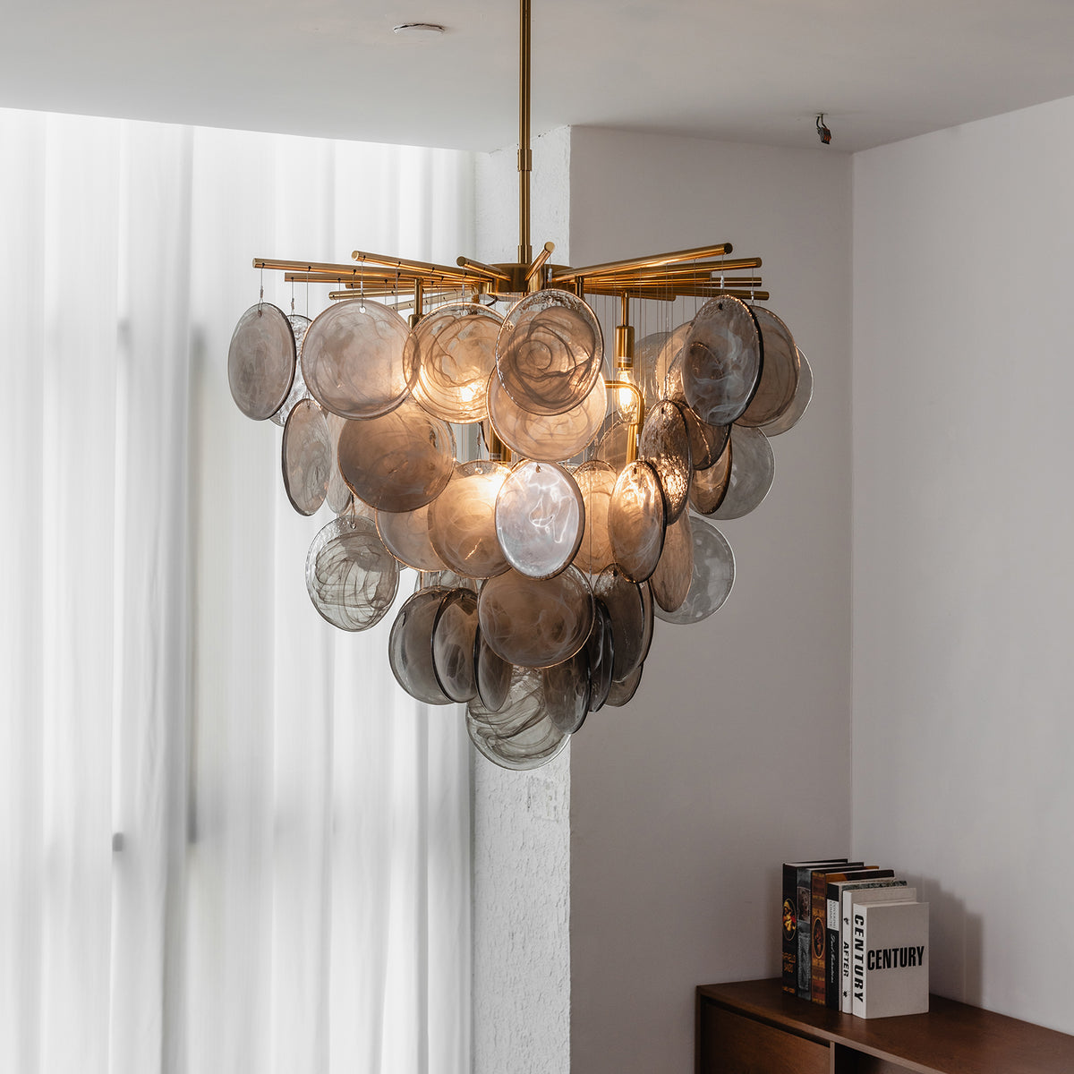 Perrin Smoked Glass Cloud Chandelier | Smoked Glass and Brass | Hanging in a bright room corner near white sheer curtains | Severn Lighting