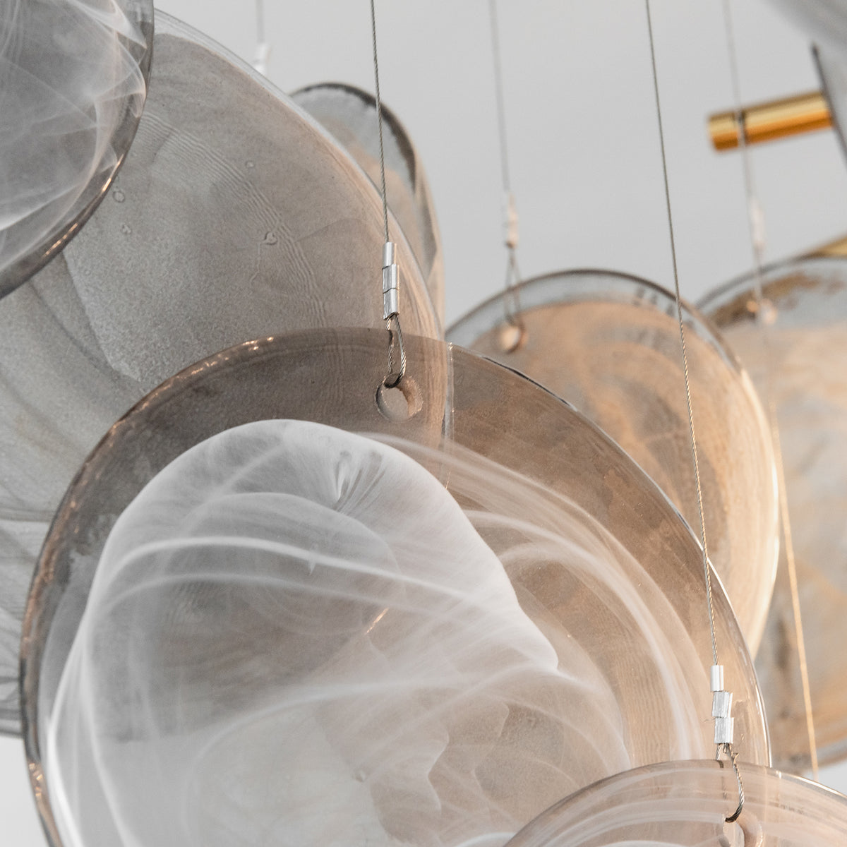 Perrin Smoked Glass Cloud Chandelier | Smoked Glass and Brass | Side angle close-up showing overlapping glass discs | Severn Lighting