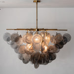 Perrin Smoked Glass Cloud Chandelier | Smoked Glass and Brass | Front illuminated view displayed in a modern studio setting | Severn Lighting