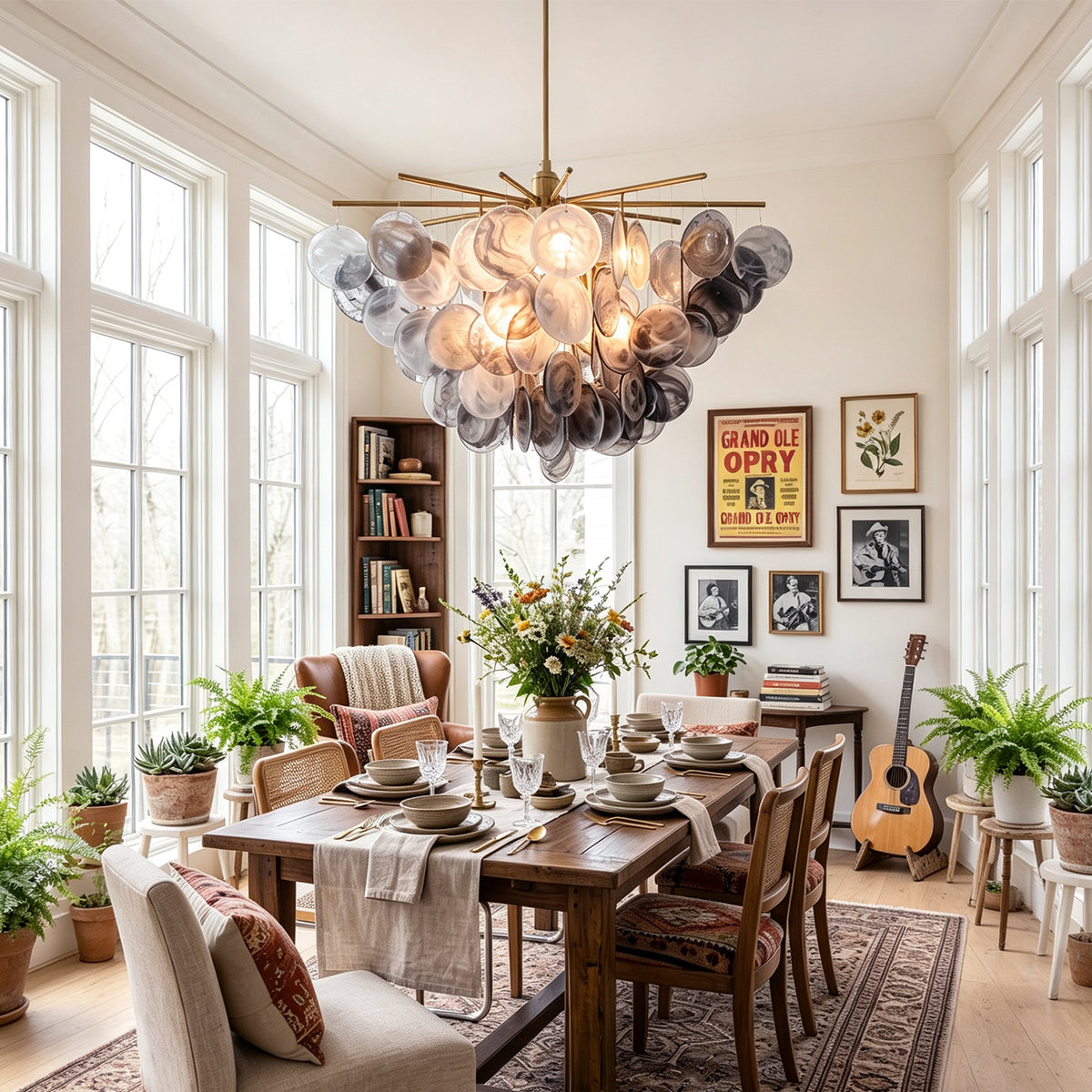 Perrin Smoked Glass Cloud Chandelier | Smoked Glass and Brass | Hanging in a bright dining room with large windows and indoor plants | Severn Lighting