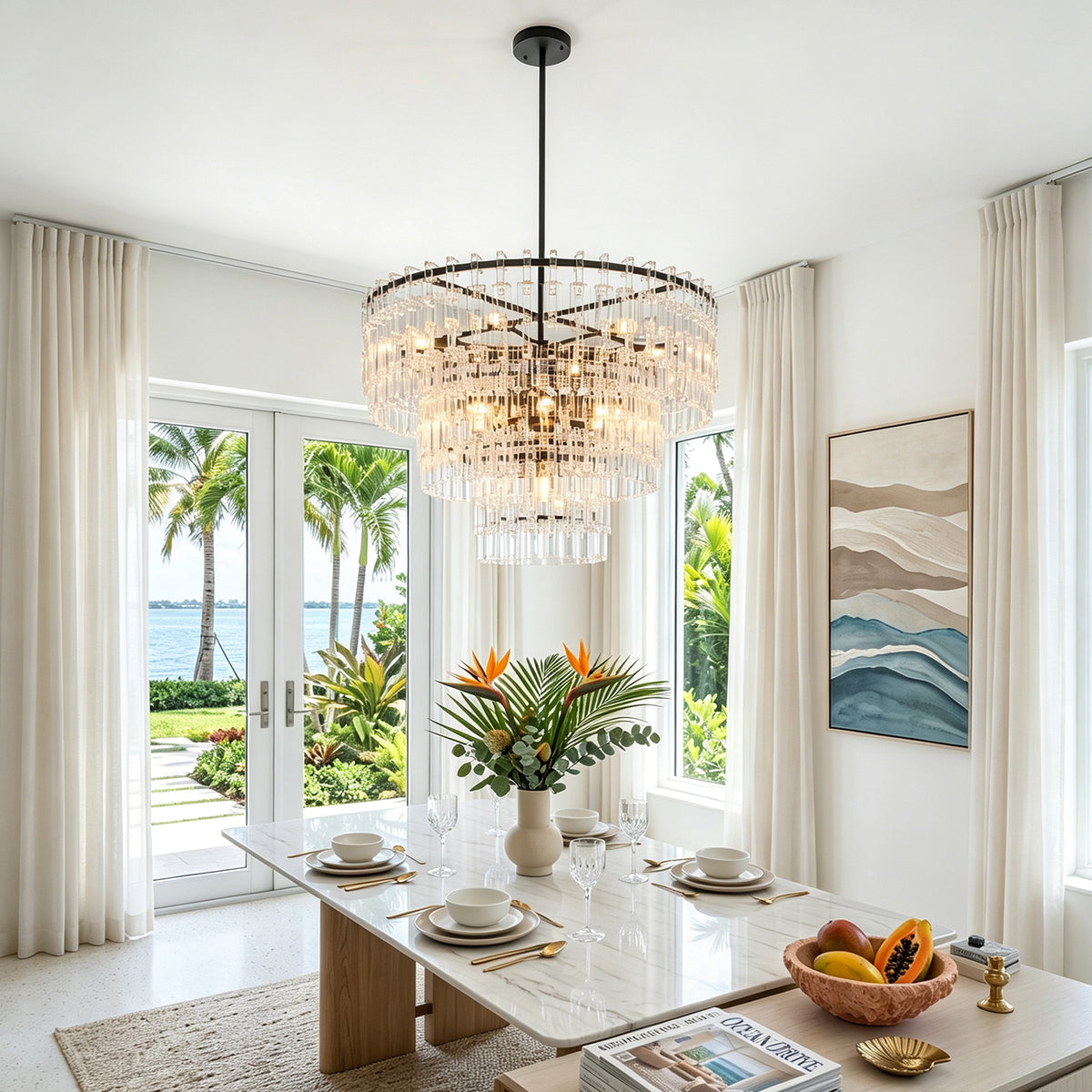Rainer Cascading Glass Rod Chandelier | Clear Glass and Black Metal | Set above a dining table in an open coastal space | Severn Lighting