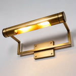 Redmond Brass Picture Wall Lamp | Brass and Metal | Low-angle view highlighting the downward warm beam and brass structure | Severn Lighting