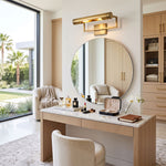 Redmond Brass Picture Wall Lamp | Brass and Metal | Mounted above a large round vanity mirror in a bright dressing area | Severn Lighting
