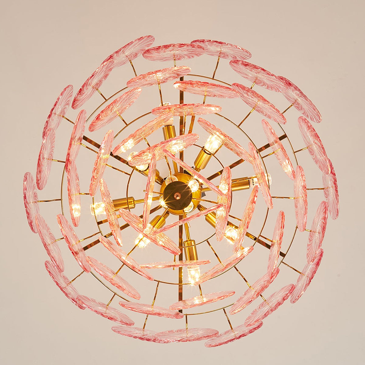 Rosalind Petal Glass Chandelier | Textured Spiral Pink Glass and Gold Metal | Directly underneath view showcasing the spiral overlapping pattern of the pink glass plates | Severn Lighting