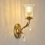 Rosamund Fluted Glass Crystal Brass Wall Lamp | Glass, Crystal and Brass | Single sconce variant glowing brightly on a warm neutral wall | Severn Lighting