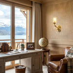 Rosamund Fluted Glass Crystal Brass Wall Lamp | Glass, Crystal and Brass | Illuminating a home office desk near a window with a mountain view | Severn Lighting