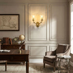 Rosamund Fluted Glass Crystal Brass Wall Lamp | Glass, Crystal and Brass | Mounted on a paneled wall in a traditional home office with an armchair | Severn Lighting