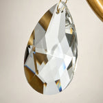 Rosamund Fluted Glass Crystal Brass Wall Lamp | Glass, Crystal and Brass | Macro close-up of the sparkling faceted teardrop crystal pendant | Severn Lighting
