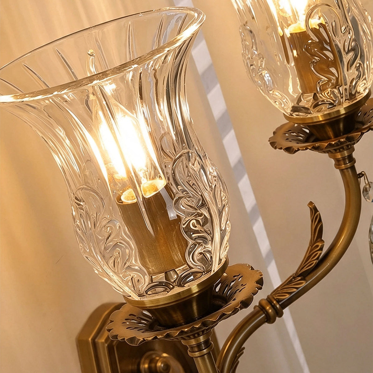 Rosamund Fluted Glass Crystal Brass Wall Lamp | Glass, Crystal and Brass | Close-up detail of the clear fluted glass shade and candle bulbs | Severn Lighting