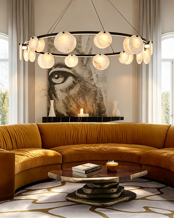 Round Branch Circle Alabaster Chandelier | Natural Alabaster and Metal | Suspended above a yellow curved sectional sofa in a modern luxury living room | Severn Lighting