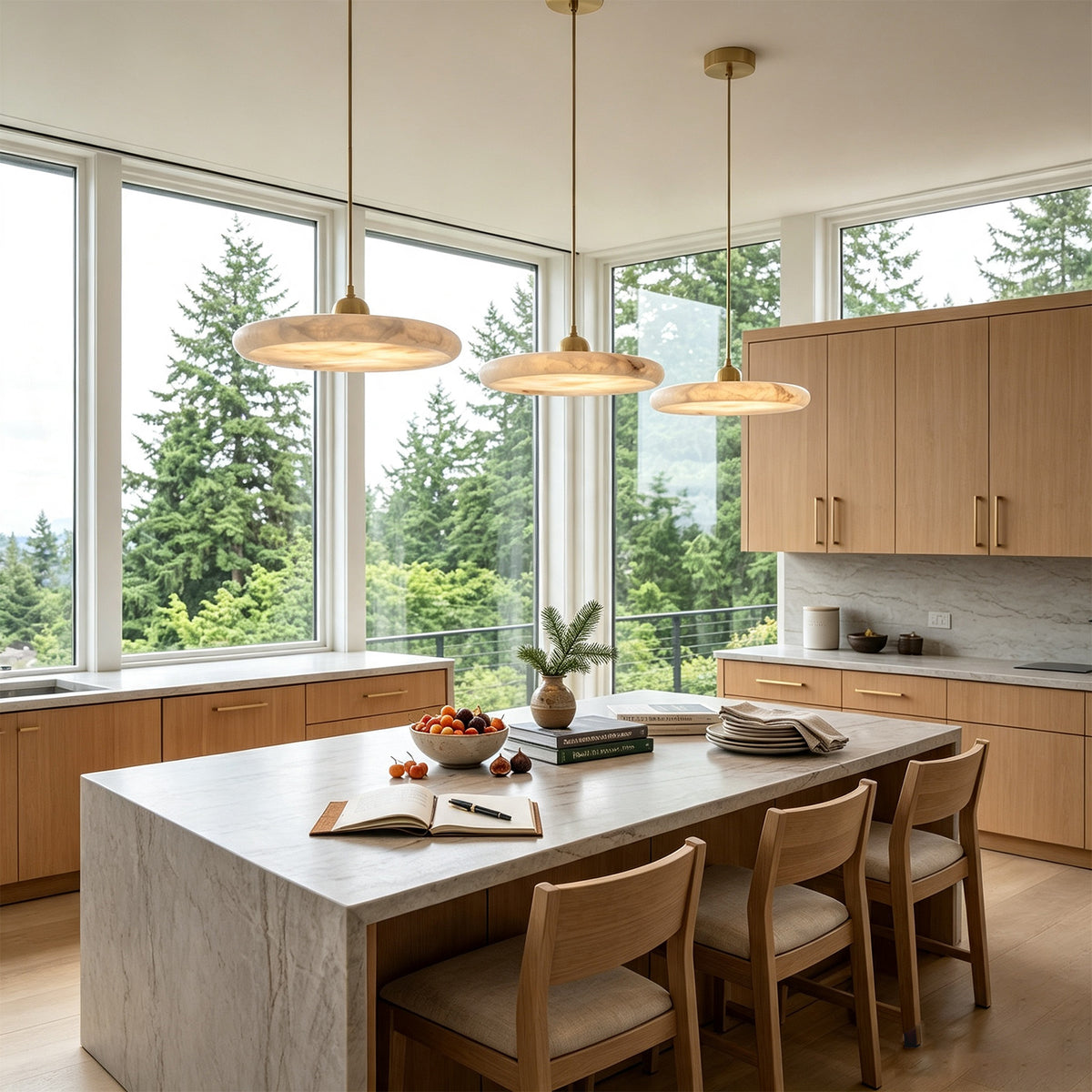 Sabine Alabaster Disc Pendant Light | Natural Alabaster and Brass | Set of three pendants displayed over a large stone kitchen island | Severn Lighting