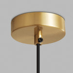 Sabine Alabaster Drum Pendant Light | Natural Alabaster and Brass | Close-up macro detail highlighting the round polished gold metal ceiling canopy and black cord | Severn Lighting