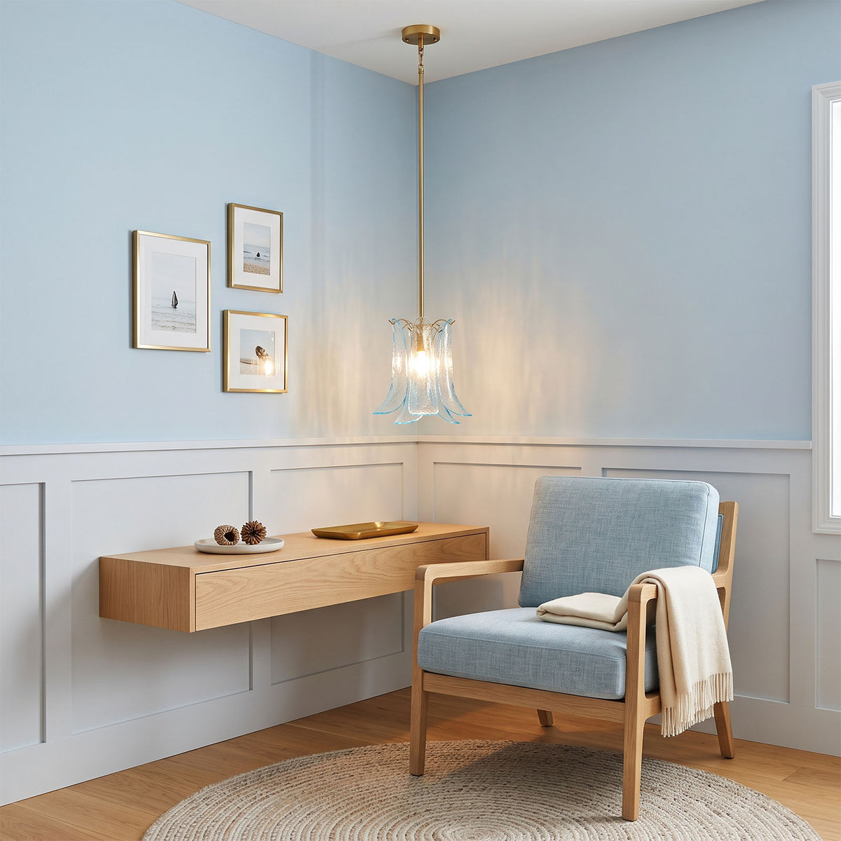 Semoy Curved Glass Petal Pendant Light | Curved Glass and Brass | Displayed in a light blue home office study area above a floating desk | Severn Lighting