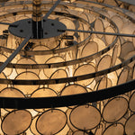 Sirena Capiz Disc Tiered Ceiling Light | Shell, Metal | Close-up top view showing the concentric black metal ring framework and ring links holding the shell discs | Detail shot | Samu Lamp