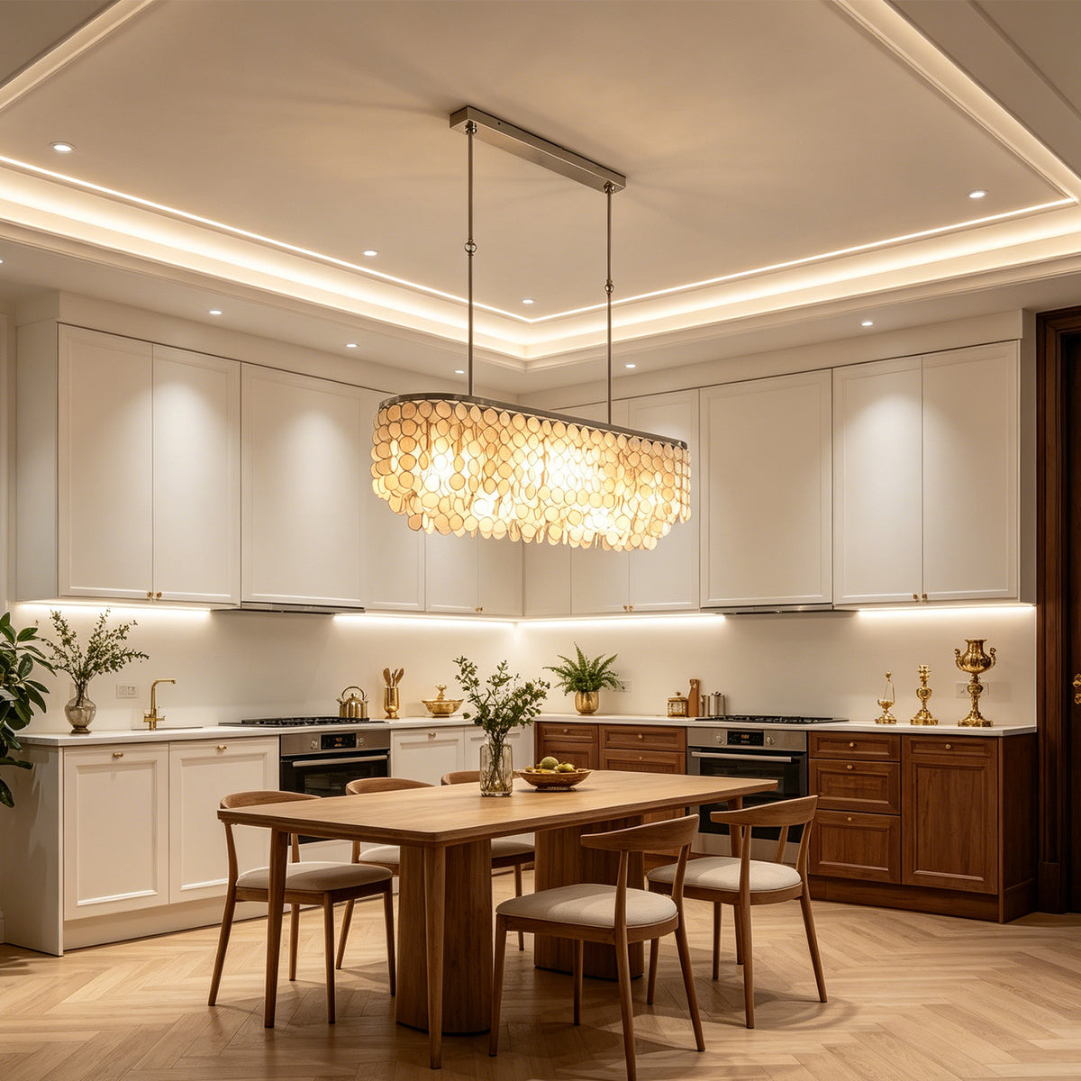 Sirena Capiz Elongated Linear Chandelier | Capiz Shell, Metal | Linear island lighting providing a bright, inviting atmosphere in a contemporary wood and white kitchen | Samu Lamp