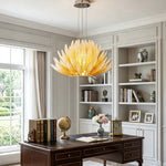 Solaris Agave Glass Starburst Chandelier | Amber Textured Glass | Illuminating an elegant home library study room above a dark wood desk and bookshelves | Severn Lighting