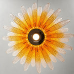 Solaris Agave Glass Starburst Chandelier | Amber Textured Glass | Directly underneath view showcasing the glowing starburst pattern of the amber glass leaves | Severn Lighting