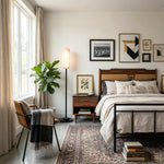 Stellan Alabaster Column Floor Lamp | Natural Alabaster, Brass and Black Metal | Standing beside a nightstand in a cozy bedroom setting | Severn Lighting