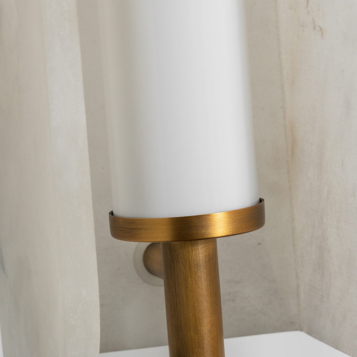 Stellan Alabaster Column Floor Lamp | Natural Alabaster, Brass and Black Metal | Close-up view of the lower shade connector with brass hardware | Severn Lighting