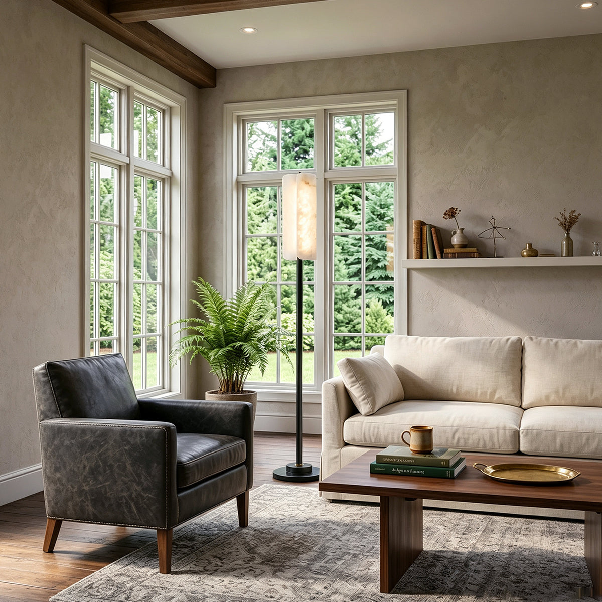 Stellan Alabaster Column Floor Lamp | Natural Alabaster, Brass and Black Metal | Enhancing a bright sitting area with large windows | Severn Lighting