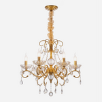 Torvald Scrolled Crystal Brass Chandelier | Cut Crystal and Brass | Front full view on a pure white background, illuminated | Severn Lighting