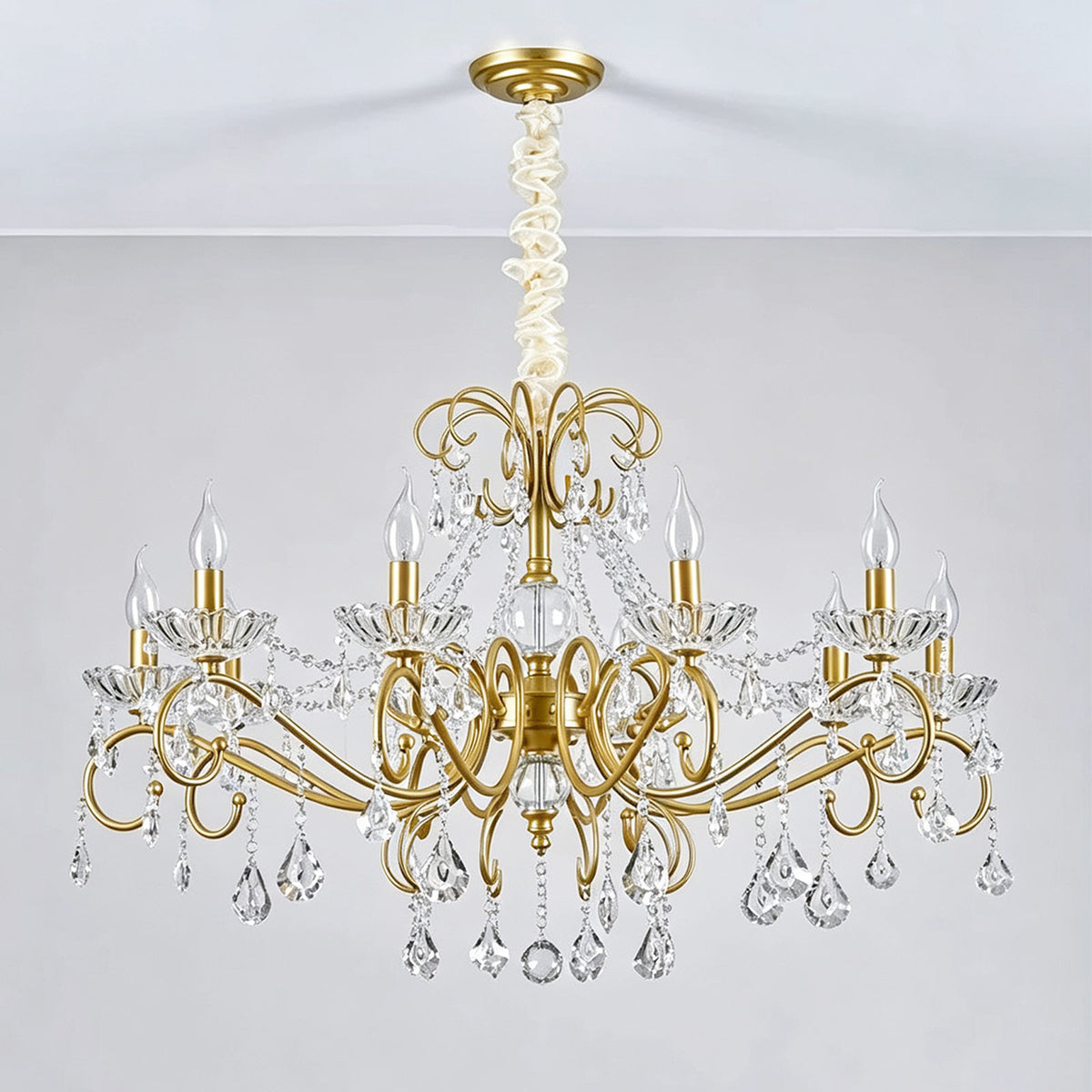 Torvald Scrolled Crystal Brass Chandelier | Cut Crystal and Brass | Full product view displayed on a plain white studio background | Severn Lighting