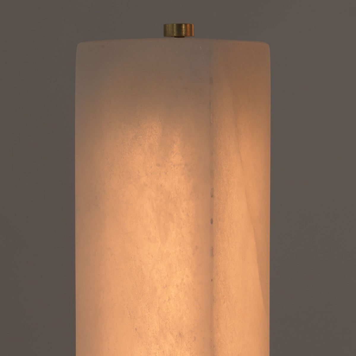 Trelune Column Floor Lamp | Translucent Alabaster | Macro lit close-up of warm glow through stone column | Severn Lighting