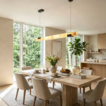 Vale Alabaster Linear Glow Pendant Lighting | Natural Alabaster and Black Metal | Illuminating a modern dining room above a light wood table surrounded by upholstered chairs | Severn Lighting