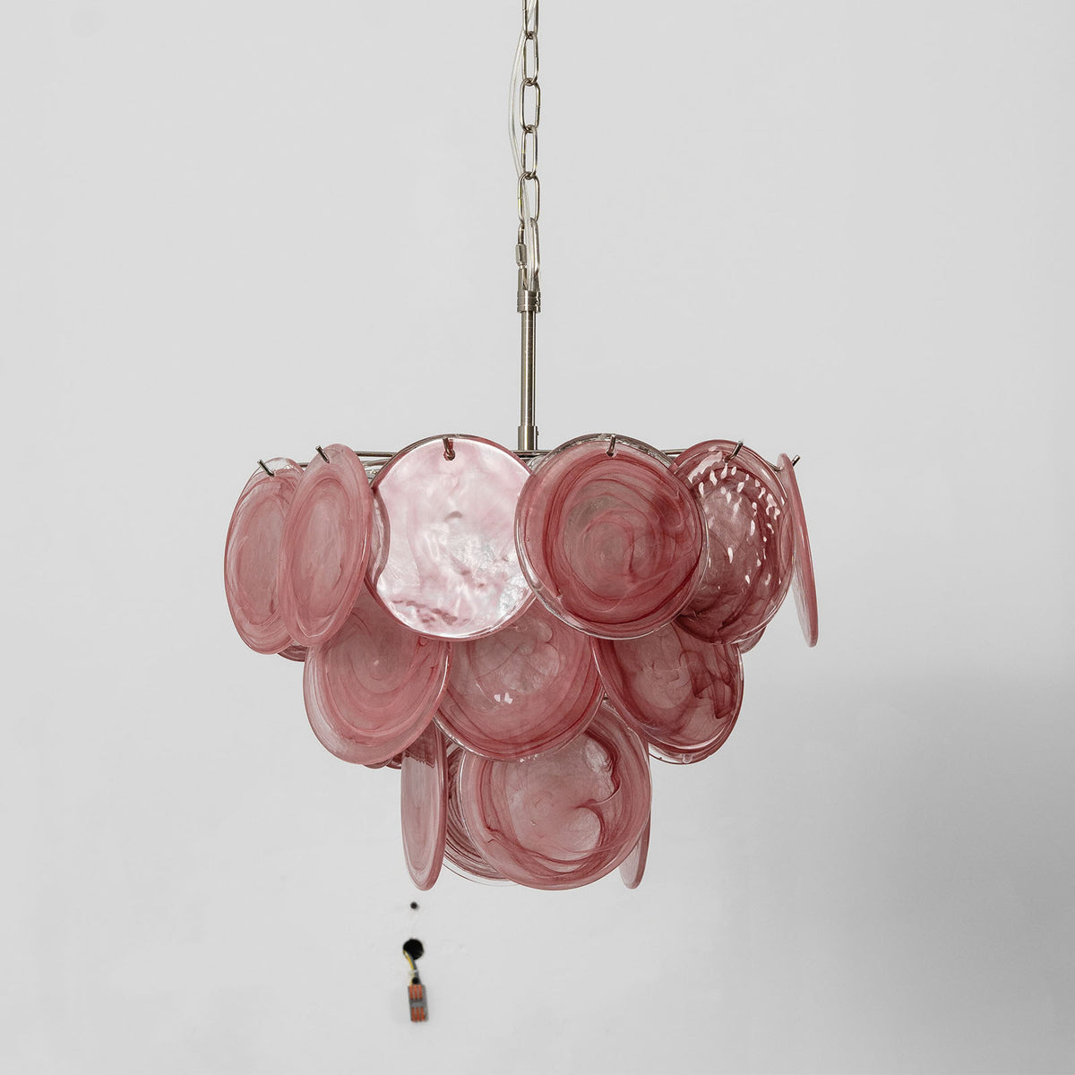 Vaucelle Swirled Glass Disc Tiered Chandelier | Swirled Glass and Brass | Full product view of pink glass disc variant on plain background | Severn Lighting