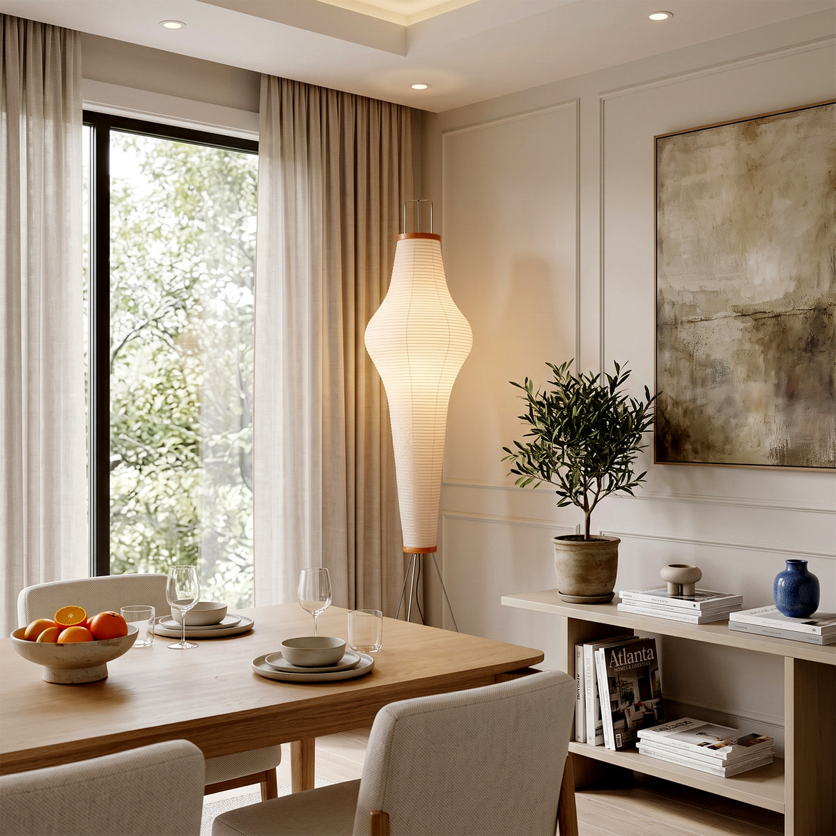 Verena Ribbed Paper Column Floor Lamp | Ribbed Paper and Metal Tripod Legs | Positioned in a modern minimalist dining room near a wooden dining table and a decorative sideboard | Severn Lighting