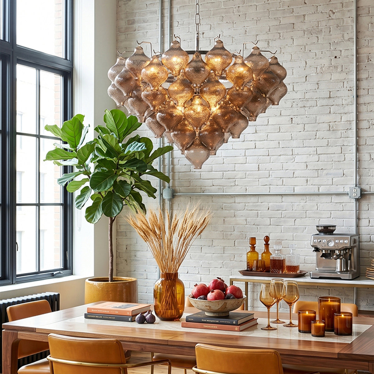 Vespera Tiered Smoked Glass Chandelier | Textured Smoked Glass | Hanging lit above a wooden dining table in an industrial loft with a white brick wall | Severn Lighting