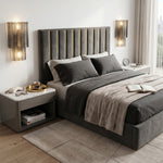 Vespera Tiered Smoky Glass Wall Lamp | Glass, Metal | Symmetrically installed on both sides of a modern channel-tufted grey headboard bed as sleek bedroom reading lights | Severn Lighting