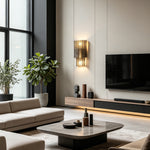 Vespera Tiered Smoky Glass Wall Lamp | Glass, Metal | Featured on a feature wall in a luxurious open-concept living room with a low cream sofa and low wooden coffee table | Severn Lighting