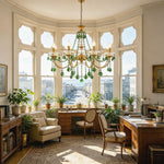 Vionne Green Crystal Drop Brass Chandelier | Green Crystal, Clear Glass and Brass | Displayed in a sunlit bay window reading area with indoor plants | Severn Lighting