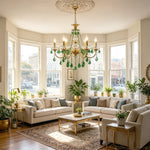 Vionne Green Crystal Drop Brass Chandelier | Green Crystal, Clear Glass and Brass | Lighting up a spacious living room with a beige sofa and bay windows | Severn Lighting