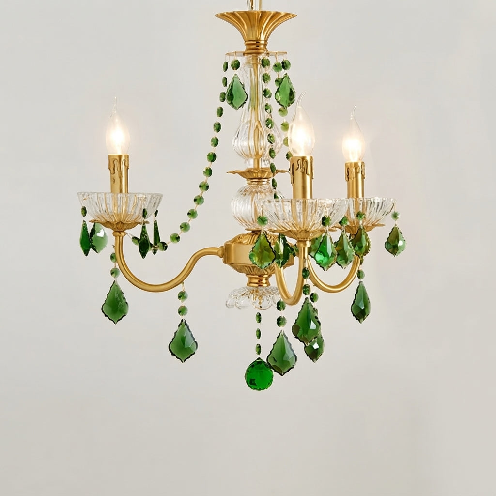 Vionne Green Crystal Drop Brass Chandelier | Green Crystal, Clear Glass and Brass | Compact variant full view glowing softly on a plain grey backdrop | Severn Lighting