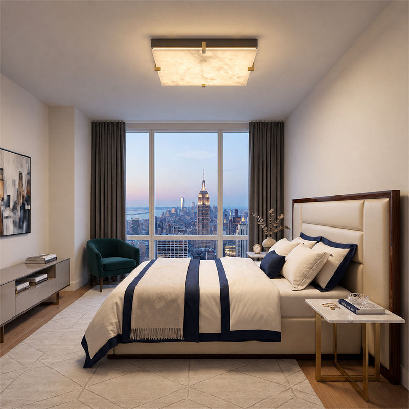 Flush mount ceiling light in a bedroom with a city view